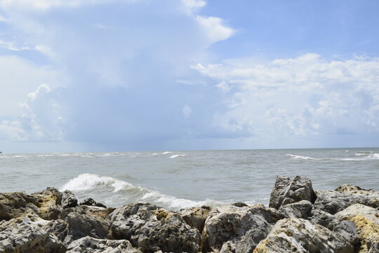island Jetti in Florida with rain storm coming in the distance