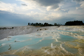 Natural travertine pools and terraces in Pamukkale, Turkey.