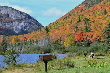 autumn landscape with lake and mountains