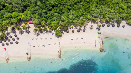 Aerial view of a paradise beach with turquoise water in Baru, Cartagena, Colombia