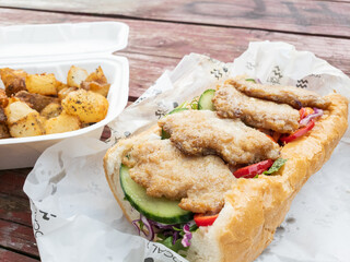 Fried fish sandwich with french fries