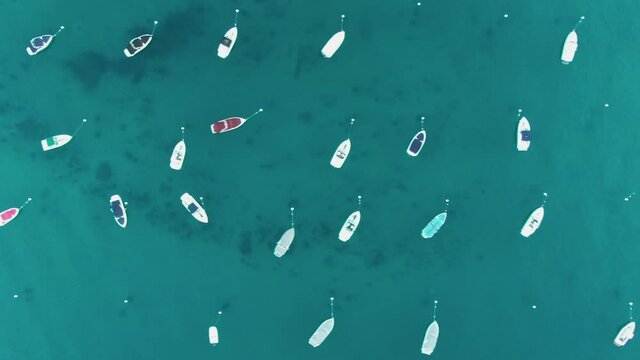 Aerial: Speed boats moored on Lake Tahoe. California, USA