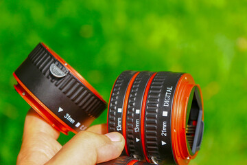 The macro rings of the dlf camera are made of black and red plastic