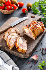 Stuffed roll of chicken with cheese and mushrooms