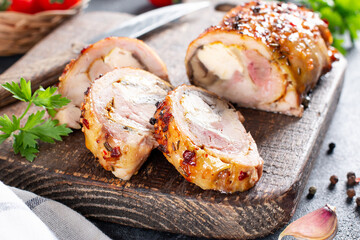 Stuffed roll of chicken with cheese and mushrooms