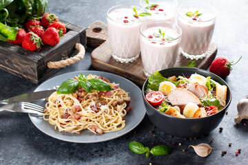 Three-course set menu for a nutritious healthy lunch. Three course set on a table in a business...