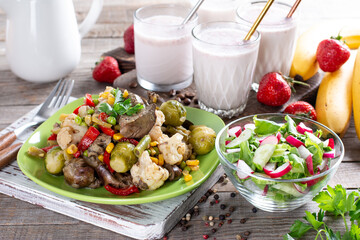 Three-course set menu for a nutritious healthy lunch. Three course set on a table in a business lunch, food set lunch. Full set of three dishes for lunch