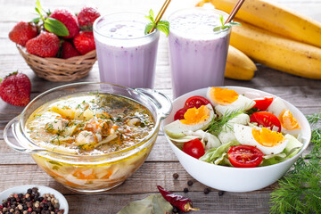 Three-course set menu for a nutritious healthy lunch. Three course set on a table in a business lunch, food set lunch. Full set of three dishes for lunch