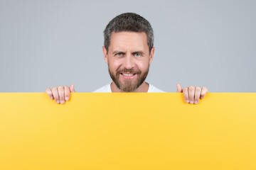 happy man with copy space for advertisement. guy advertising. announcement.