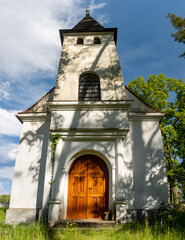 Naklejka premium Chapel in the cemetery at countryside