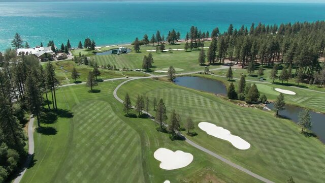 Aerial: Golf course and Lake Tahoe, California, USA