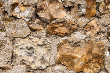 Close up of an old brick wall in Honfleur, France, for abstract background texture.