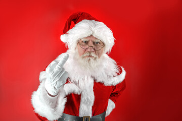Emotional senior male model old man with a natural white beard Father Christmas
