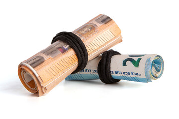Roll of euro banknotes tied with a rubber band