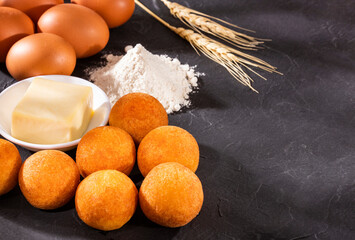 Traditional Colombian buñuelos (Deep Fried Cheese Bread) Text space