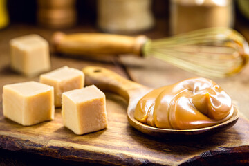 spoon of dulce de leche or homemade sweet caramel, called Dulce de lethe in Brazil