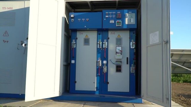 Open control panel of a transformer at a solar power station