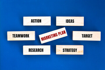 MARKETING PLAN concept with Wooden Blocks