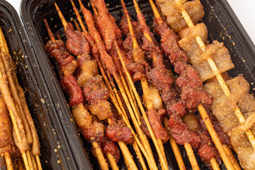 A variety of snack stalls grilled kebabs