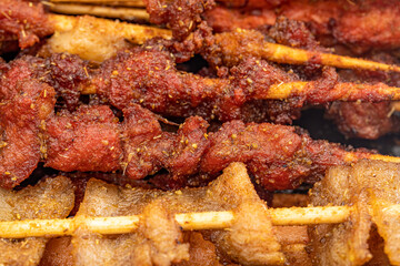 A variety of snack stalls grilled kebabs
