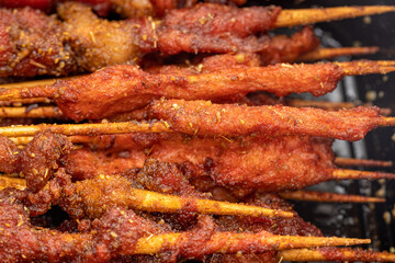 A variety of snack stalls grilled kebabs