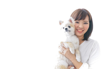 犬を抱く女性・ブリーダー