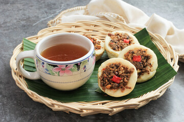 Kue Talam Oncom, Traditional Steamed Cup Cake from Indonesia with Oncom Topping. Oncom is One...