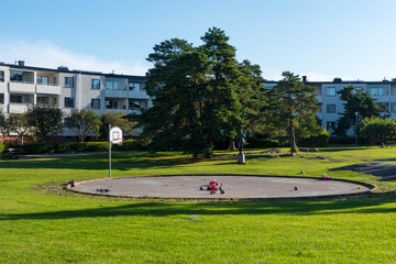 Obraz premium Stockholm, Sweden Aug 20, 2021 Aplayground in a residential housing complex in the Arsta suburb.