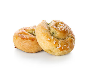 Puff pastry stuffed with spinach on white background