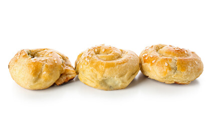 Puff pastry stuffed with spinach on white background