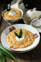 Red and White Porridge (Bubur Merah Putih or Jenang Sengkolo) is a Dish for Welcome the Birth of a Baby in the Javanese. Made from Rice, Sugar, Coconut Milk, Pandan Leaves, and Salt.