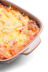 Baking dish with tasty vegetable lasagna on white background, closeup