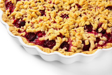 Baking dish with tasty cherry pie on white background, closeup