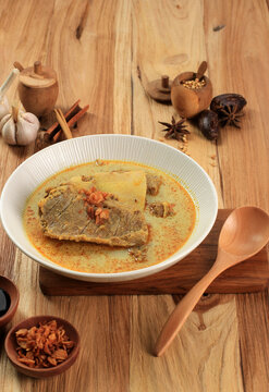 Gule Kambing or kari Kambing Jawa Timur or East Java Lamb Curry, Delicious Menu for Eid al Adha. Usually Served with Sate Kambing (Mutton Skewers)