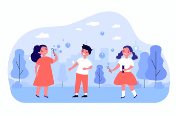 Fototapeta premium Cute cartoon children blowing soap bubbles outside together. Happy kids having fun in park flat vector illustration. Childhood, outdoor activity concept for banner, website design or landing web page