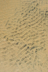 Sand texture., marks in the sand on the beach when the tide goes out