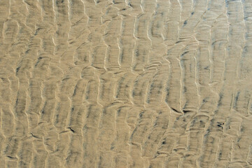 Sand texture., marks in the sand on the beach when the tide goes out