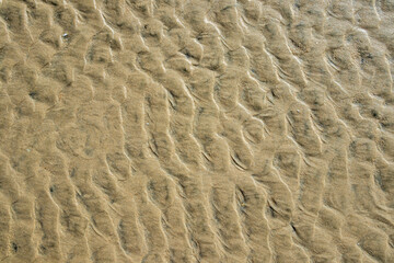 Sand texture., marks in the sand on the beach when the tide goes out