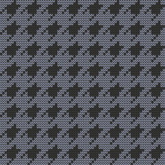 Knitted seamless goosefoot pattern. Goose foot design on blue background. Vector illustration.