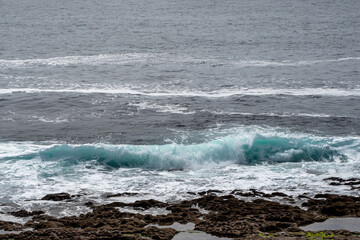 Powerful wave at the coast of Inishmore, Aran Islands, County Galway, Ireland. Irish landscape