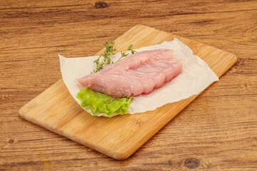Raw turkey breast steak for cooking