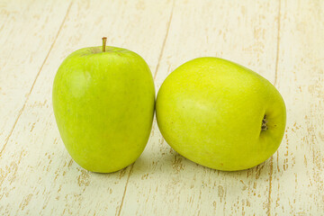 Two ripe green sweet apples