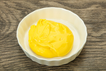 Natural cheese sauce in the bowl