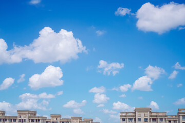 The sky is blue and white clouds are blooming