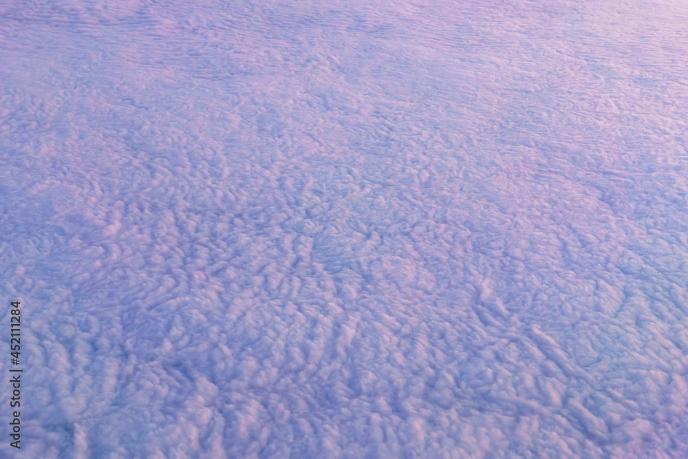 Wall mural clouds background view from the plane. white beautiful clouds top view texture