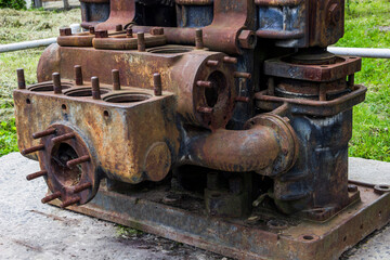 Fototapeta na wymiar old hydraulic pump of 1900s