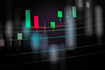 Abstract financial trading graphs and digital number of foreign exchange market trading on monitor. Background of gold and blue digital chart to represent stock market trend.