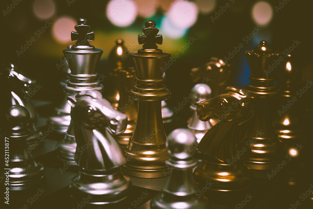 Poster closeup of chess characters on board games. to represent decision making in term of business strateg