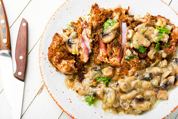 Turkey schnitzel with fried mushrooms