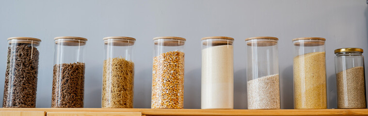 Glass jars with cereals in an eco friendly store. The concept of a grocery store without plastic...